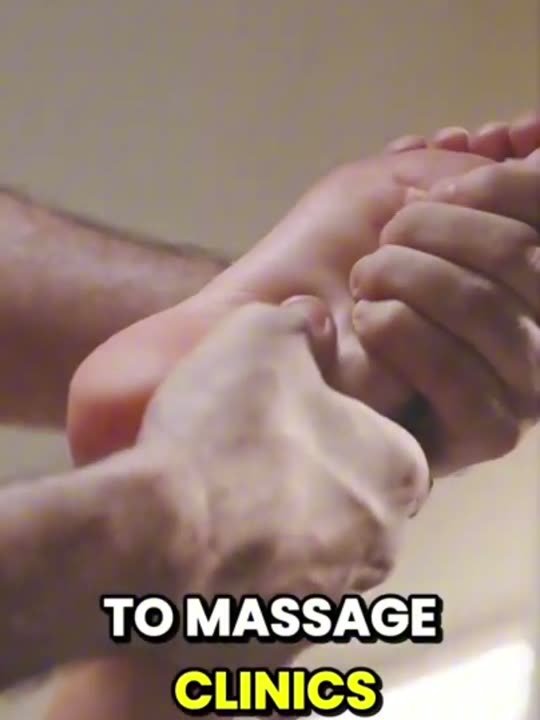Hands massaging a foot, a scene from the video on neuropathy in the feet